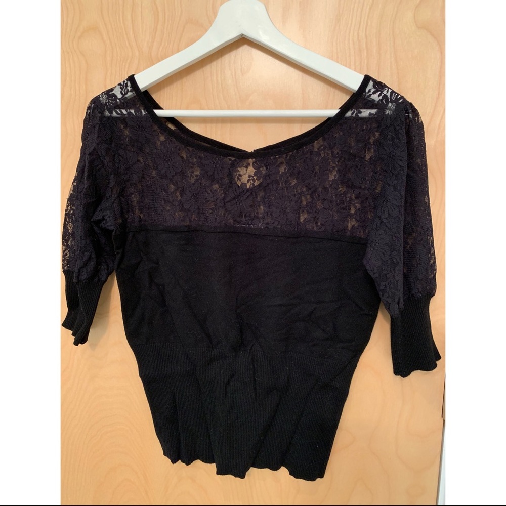 Black lace knit, good shape on waist and breast.
